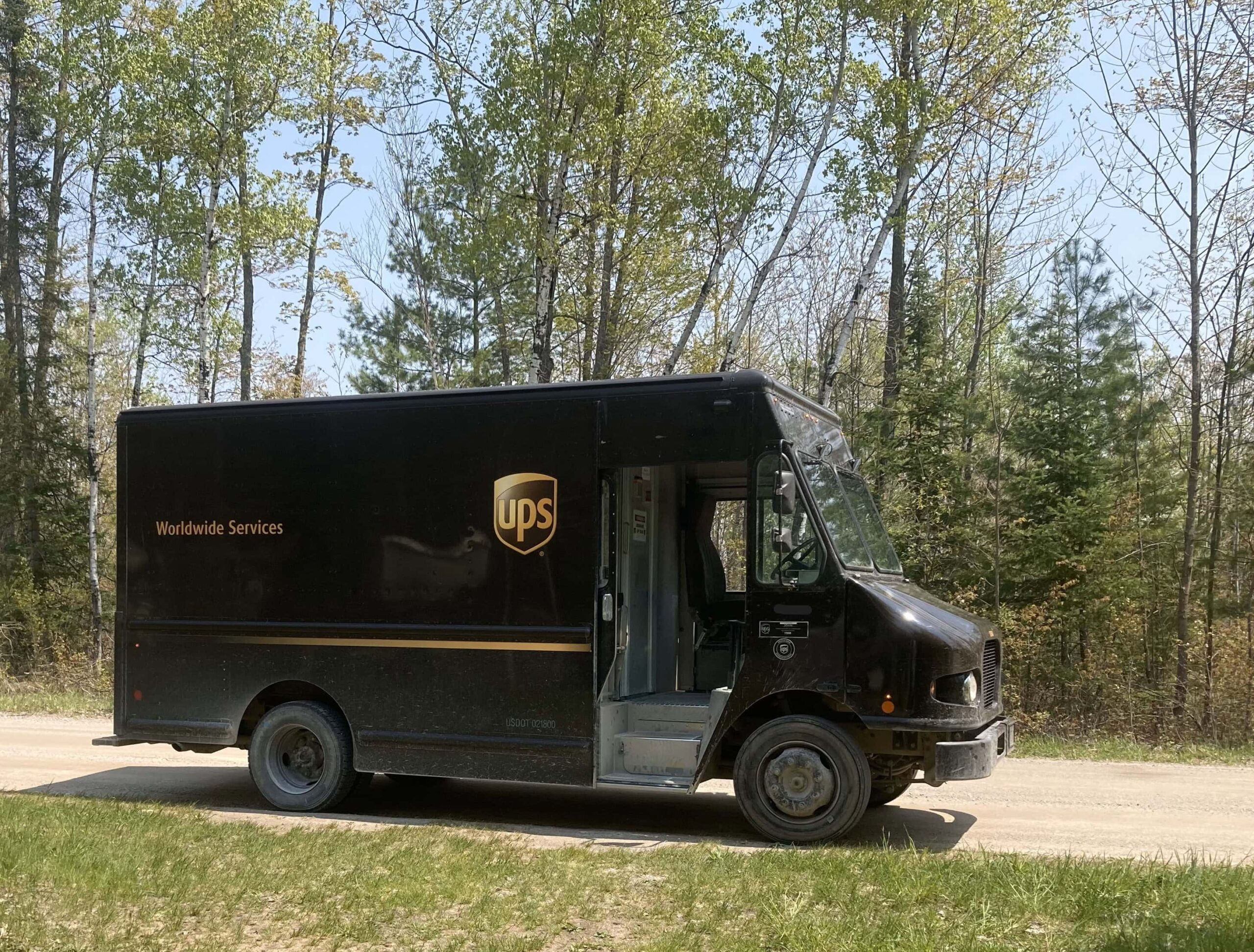 A UPS truck delivering packages